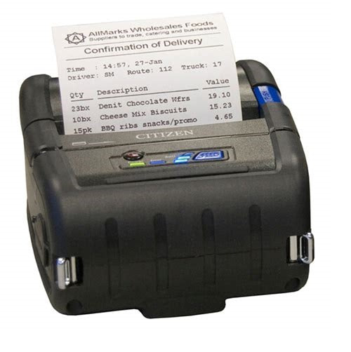 Impresora CMP-30II en uso imprimiendo etiqueta