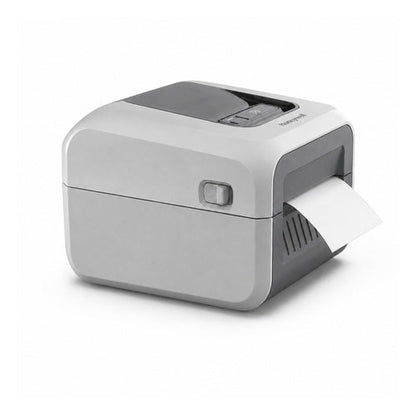 Impresora de etiquetas Honeywell PC41E PC41EDB010300 en uso sobre fondo blanco