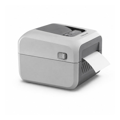 Impresora de etiquetas Honeywell PC41E PC41EDB010300 en uso sobre fondo blanco