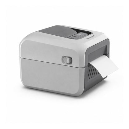 Impresora de etiquetas Honeywell PC41E PC41EDB010200 en uso sobre fondo blanco