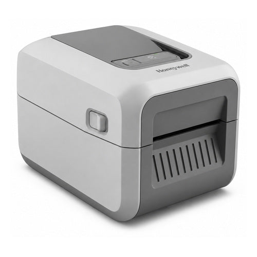 Detalle de la impresora de etiquetas Honeywell PC42E negro con su zona de trabajo